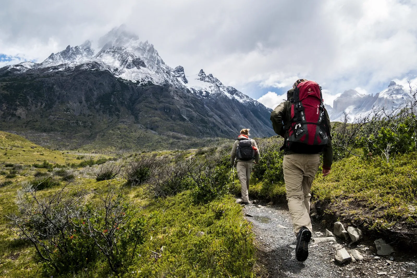Active middle-aged adults hiking in the British countryside